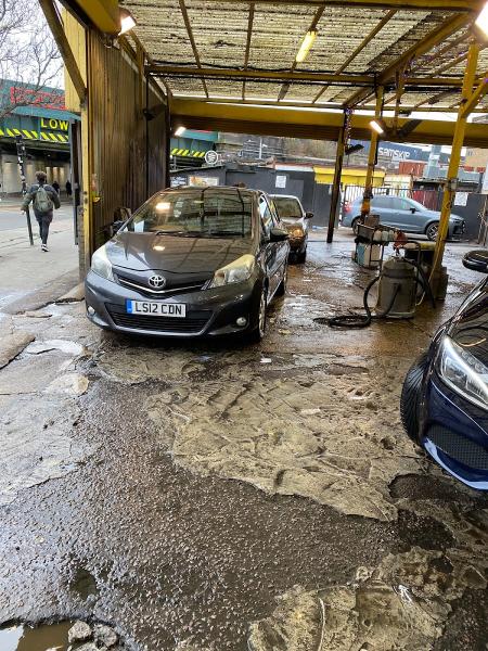 Big Yellow Hand Car Wash