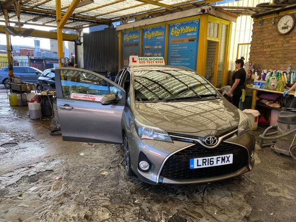 Big Yellow Hand Car Wash