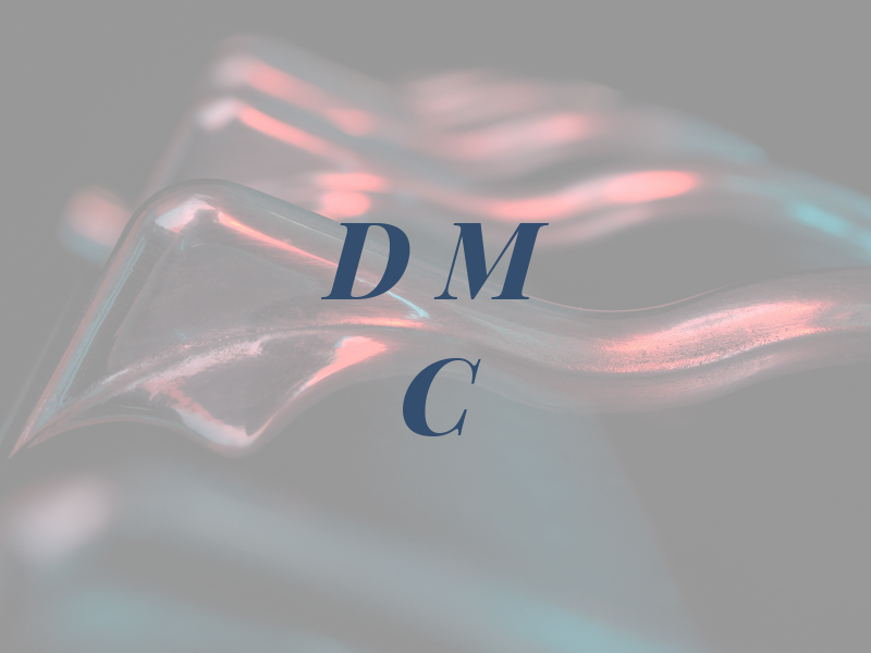 D M C